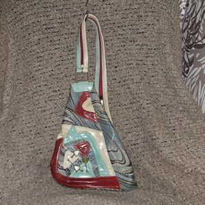 CIRQUE DU SOLEIL-Collector’s Edition Leather Convertible to Backpack-Multi-Color